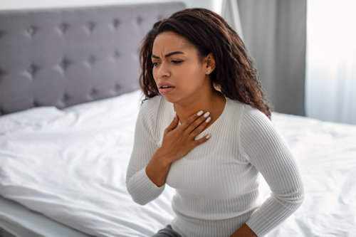 young-black-woman-coughing-suffering-from-sore-th-2021-09-02-22-26-39-utc.jpg